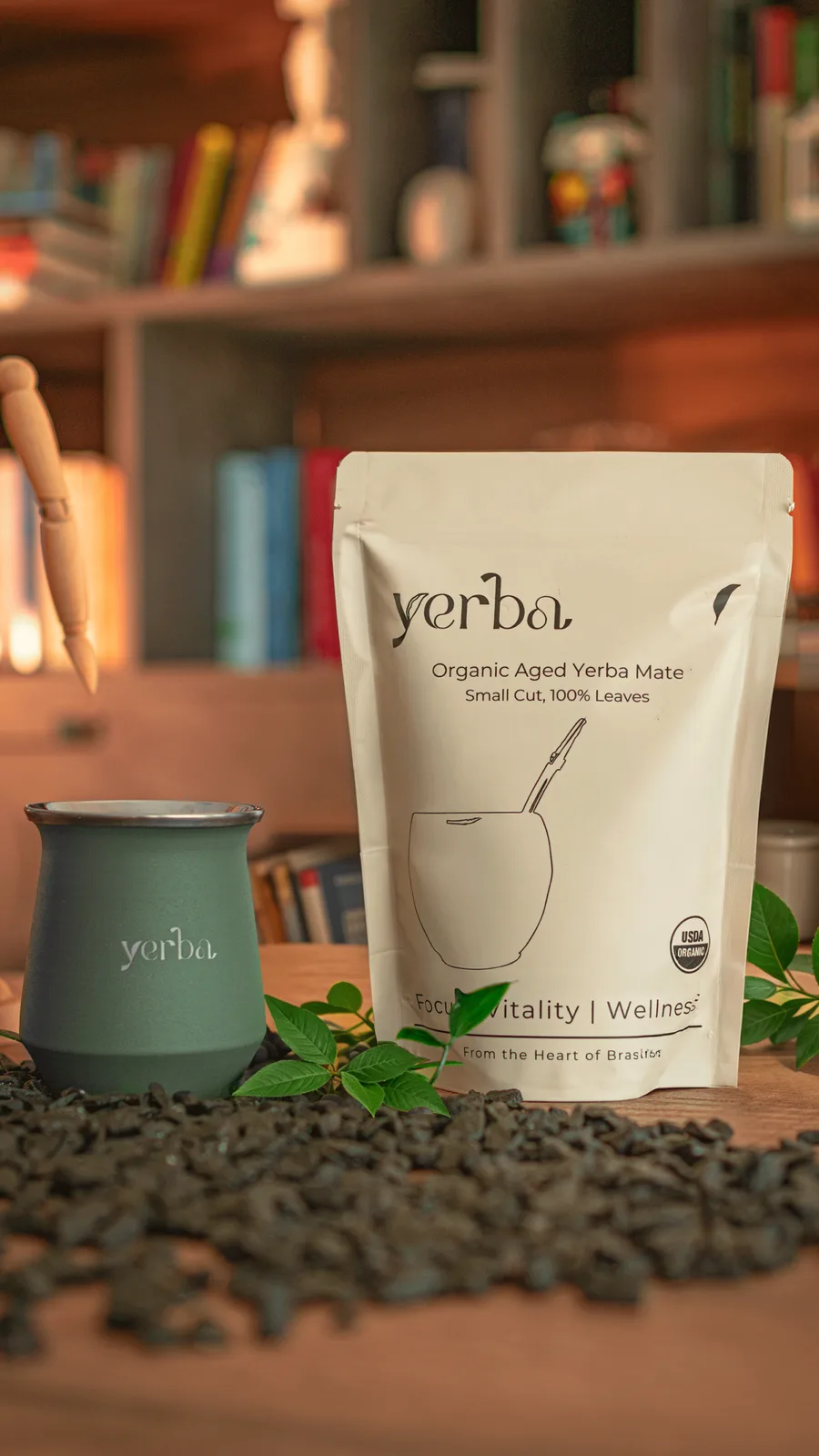 Yerba organic maté pouch beside a green stainless steel gourd